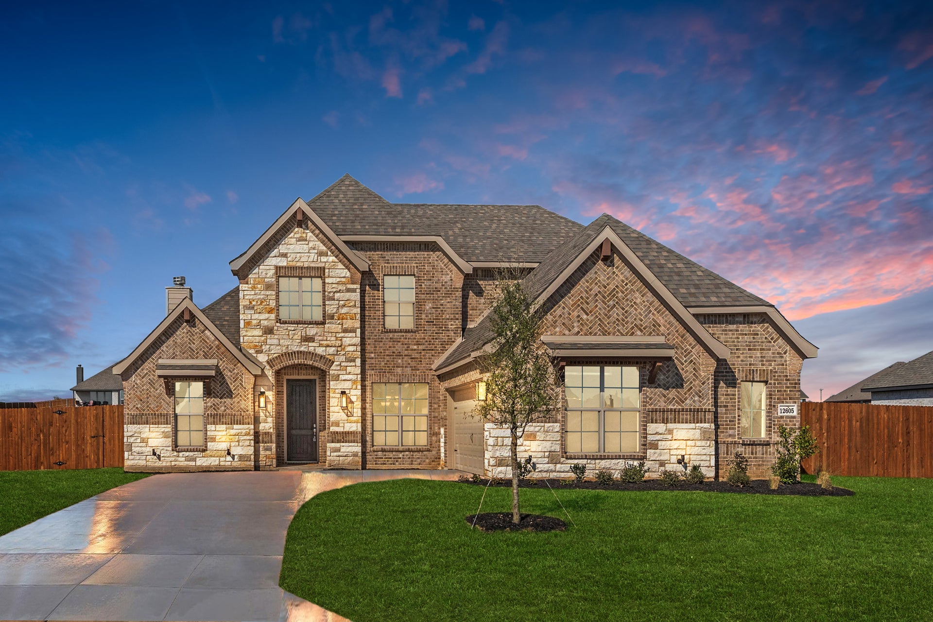2972 C with stone. New Home in Burleson, TX