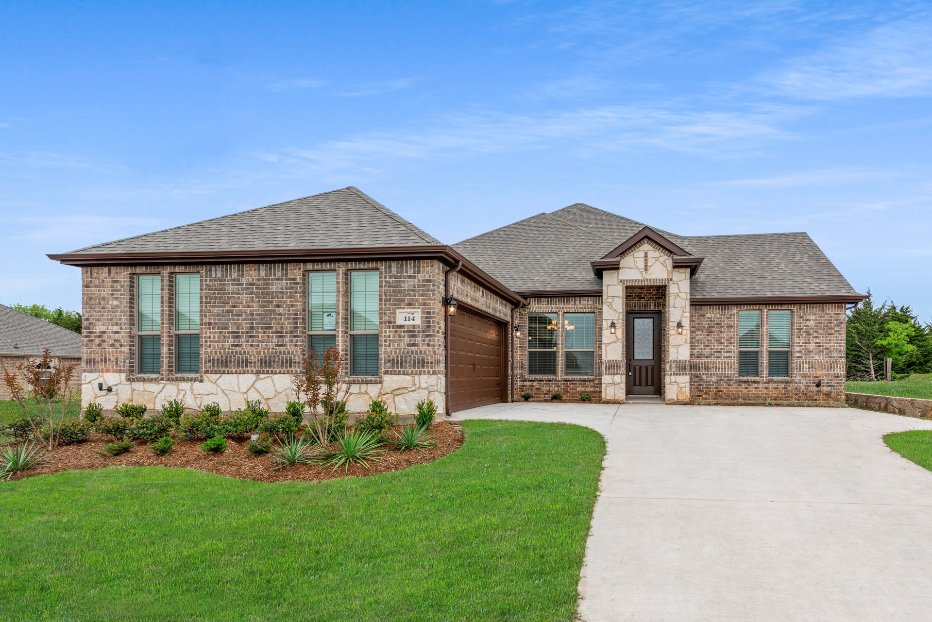 2404 A with Stone. 2,404sf New Home in Granbury, TX