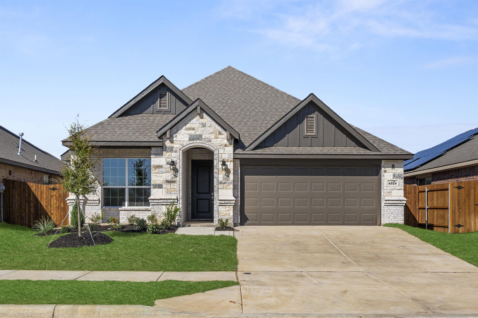 1638 C with Stone. Concept 1638 New Home in Cleburne, TX